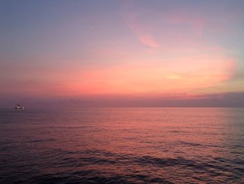 Scenic view of sea at sunset