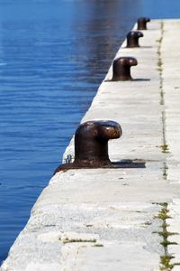 Close-up of pier on lake