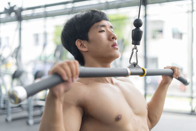 Man exercising in gym