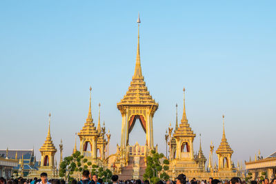 View of temple against building