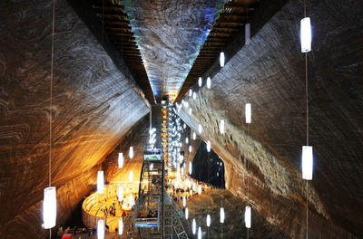 Low angle view of illuminated lights at night