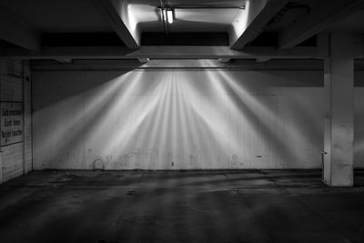 View of empty illuminated tunnel