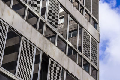 Low angle view of modern building against sky