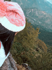 High angle view of person wearing hat