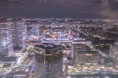 Illuminated cityscape at night