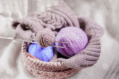 Close-up of wool in wicker basket