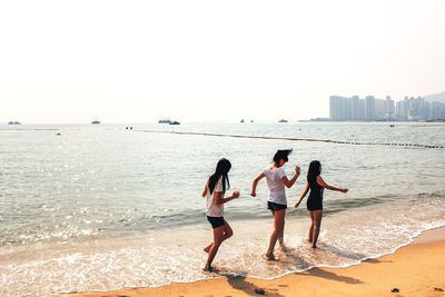 People walking on beach