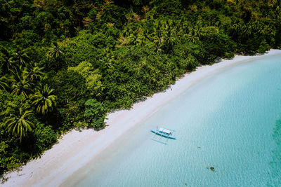 High angle view of boat on sea shore