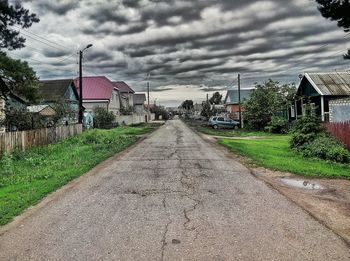 Road against cloudy sky