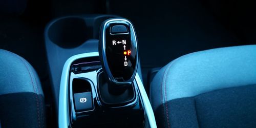 Close-up of gearshift in car