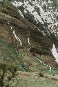 High angle view of rocks on road