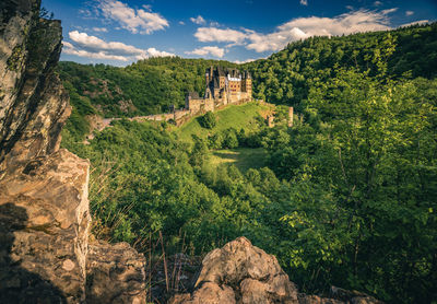 High angle view of castle on rock formations