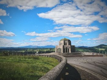 View of historical building against cloudy sky