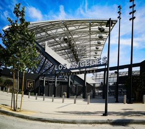 View of text on footpath against sky