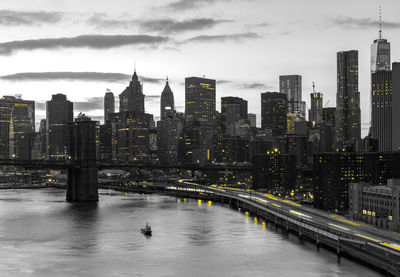 View of river and buildings in city