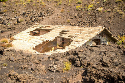 High angle view of old ruin on field