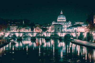 Reflection of illuminated buildings in water