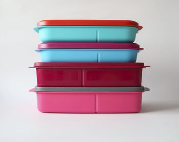 Close-up of red stack over white background