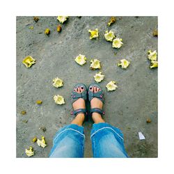 Low section of woman standing on ground