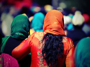 Rear view of people in traditional clothing