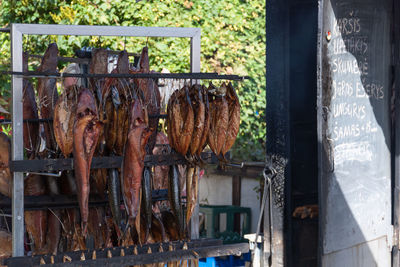 Clothes hanging on barbecue grill