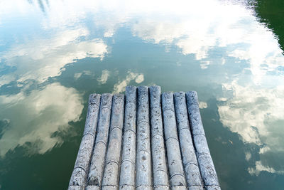 High angle view of pier on lake against sky