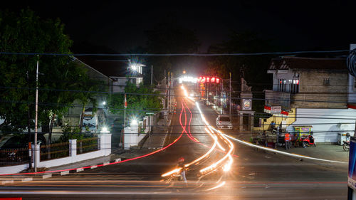 Light trails on city street at night