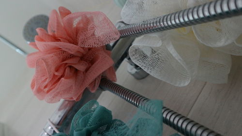 Close-up of pink flower on table at home