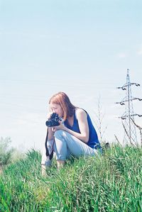 Woman on grassy field