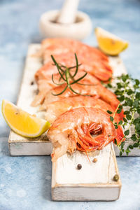 Close-up of fish served in plate on table