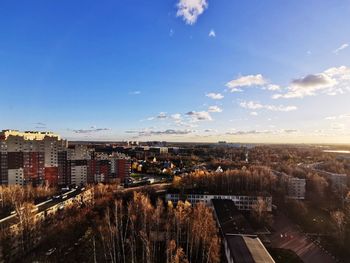 High angle view of buildings in city against sky