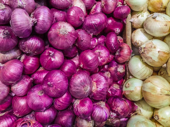 Full frame shot of onions at market