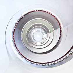 Low angle view of spiral staircase in building