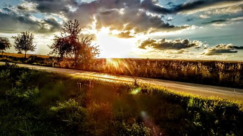 Scenic view of landscape against sky during sunset