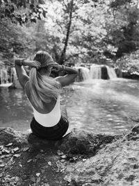 Rear view of woman in water