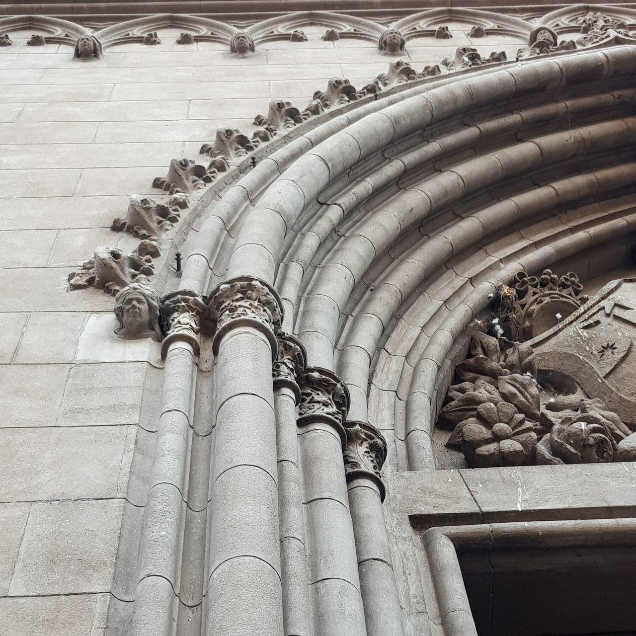 LOW ANGLE VIEW OF BUILDING EXTERIOR