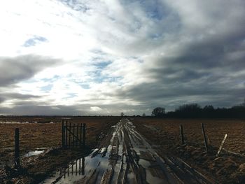 View of road against cloudy sky