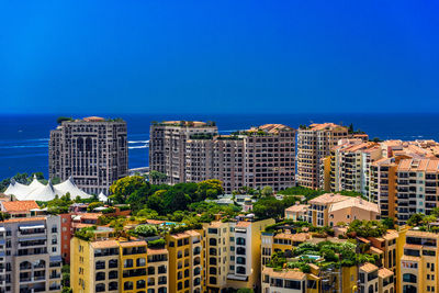 Buildings against blue sky