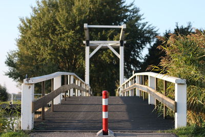 Close-up of gazebo in park against sky