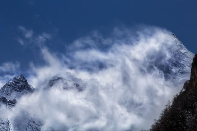 Low angle view of clouds in blue sky