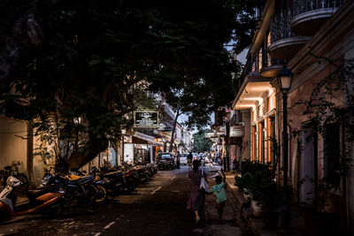 People walking on street in city