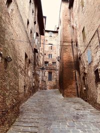 Narrow alley amidst old buildings