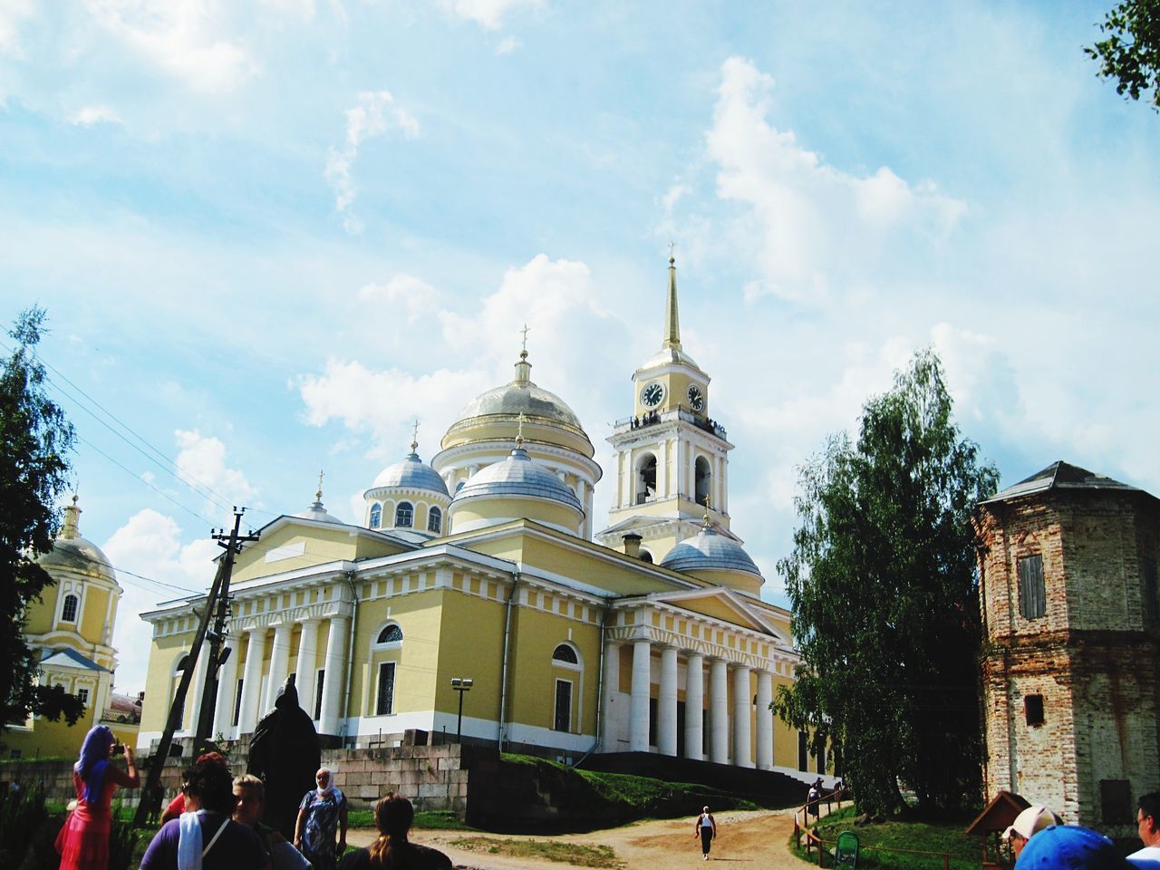 building exterior, architecture, built structure, place of worship, religion, spirituality, dome, sky, church, men, person, large group of people, cloud - sky, lifestyles, tourism, travel destinations, famous place