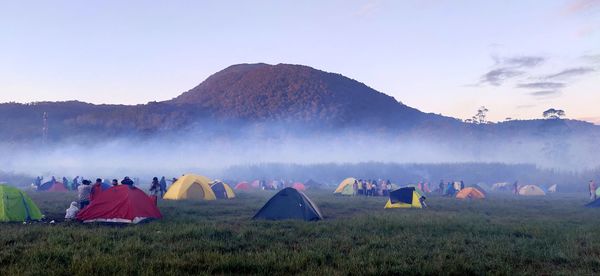 Panoramic shot of tent on field against sky