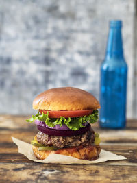 Close-up of hamburger on table