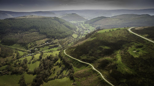 High angle view of road amidst landscape against sky