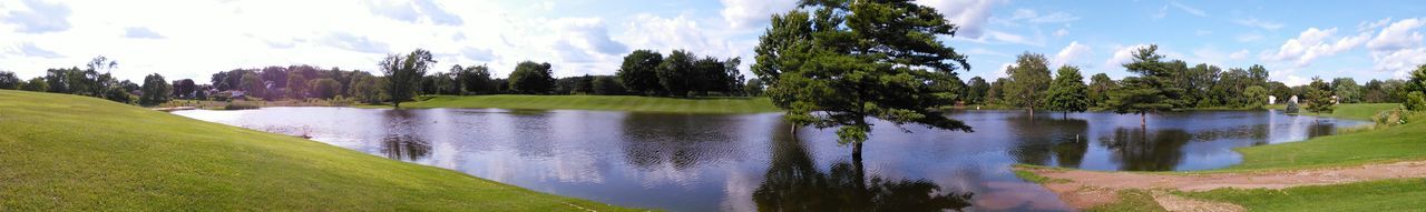 Panoramic view of lake against cloudy sky