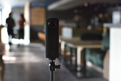 Close-up of camera on table