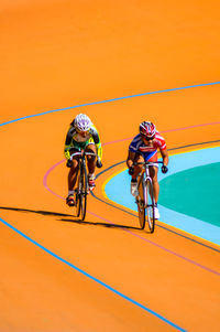 Man riding bicycle on road