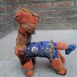 Close-up of stuffed toy against wall